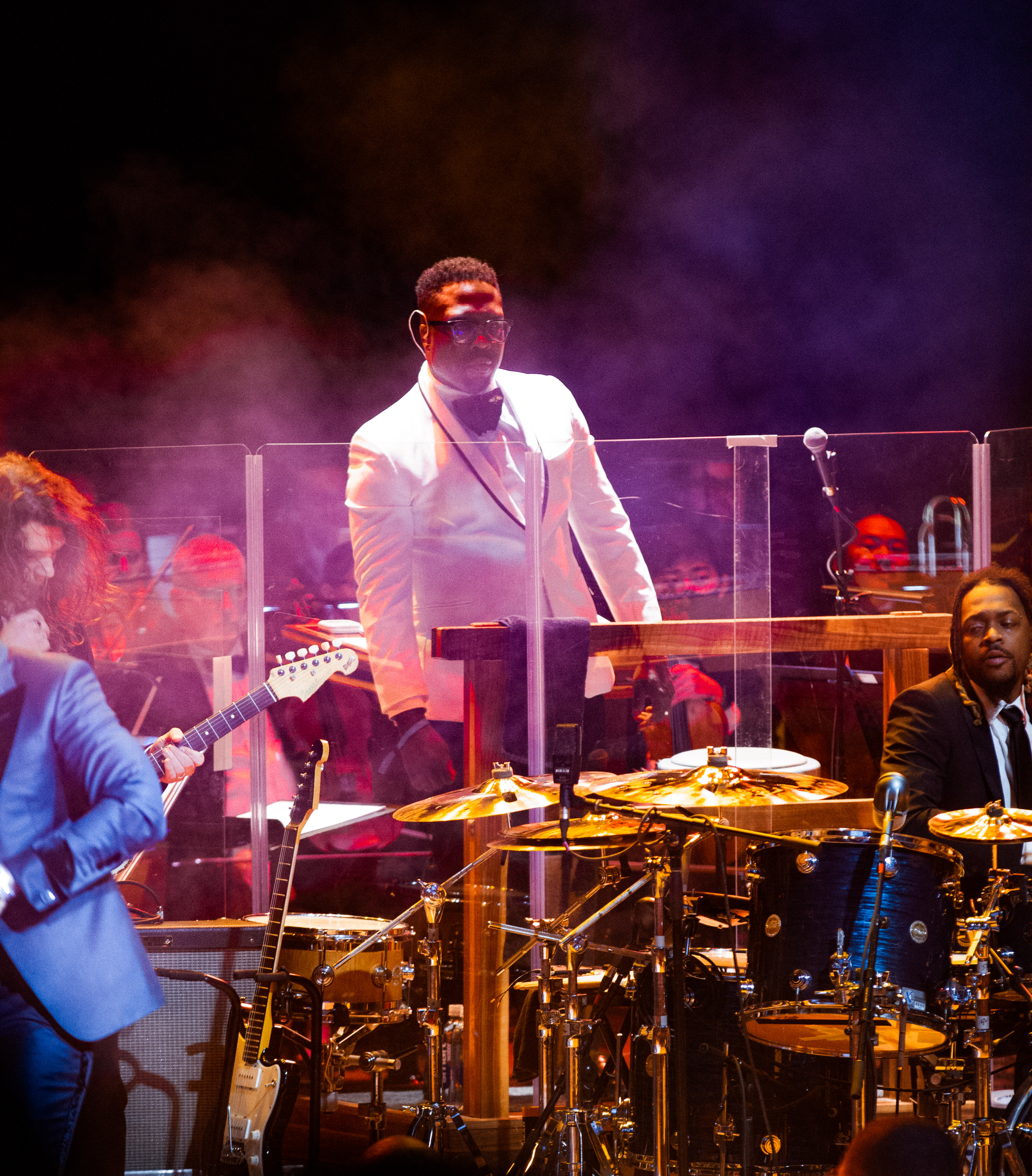 Derrick Hodge conducting the Color of Noize Orchestra